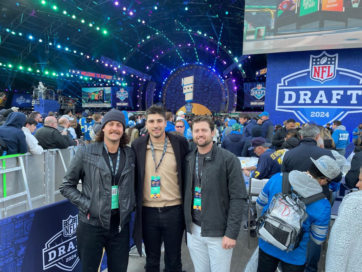 Detroit Tigers pitchers Jason Foley (left), Alex Faedo (center) and Casey Mize (right) attend the first round of the 2024 NFL Draft at the draft theater in Detroit on Thursday, April 25, 2024.