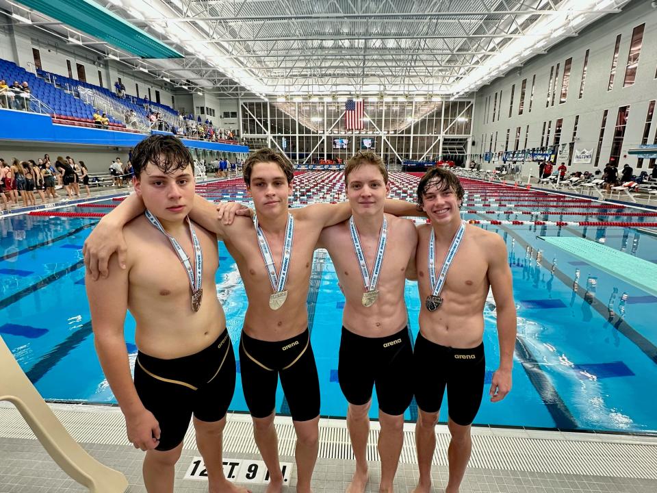(From Left to Right) Booker T. Washington's Max Little, Ian Malone, Logan Robinson and Coulson Voeltz celebrate after winning the 200-yard medley relay during the Class 3A State Championship on Saturday, Nov. 11, 2023 from in Ocala.