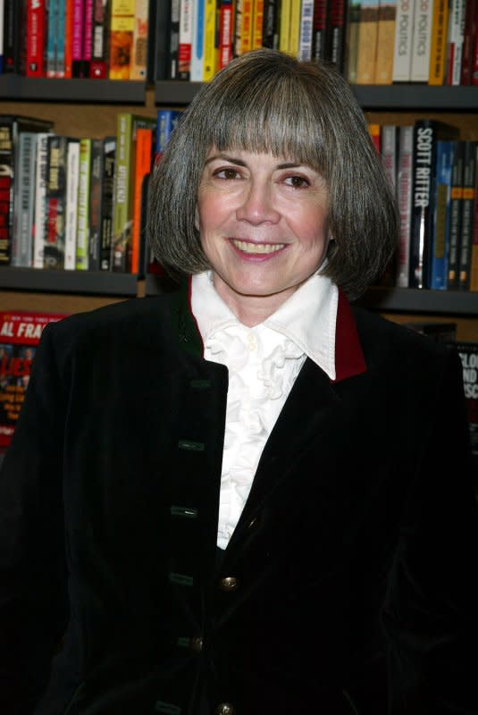 Anne Rice signs copies of her new book "Christ the Lord" at Posman's Bookstore at Grand Central Station in New York on November 1, 2005. On April 12, 1976, Knopf published Anne Rice's debut novel, Interview with a Vampire, the first of a series of several books. File Photo by Laura Cavanaugh/UPI