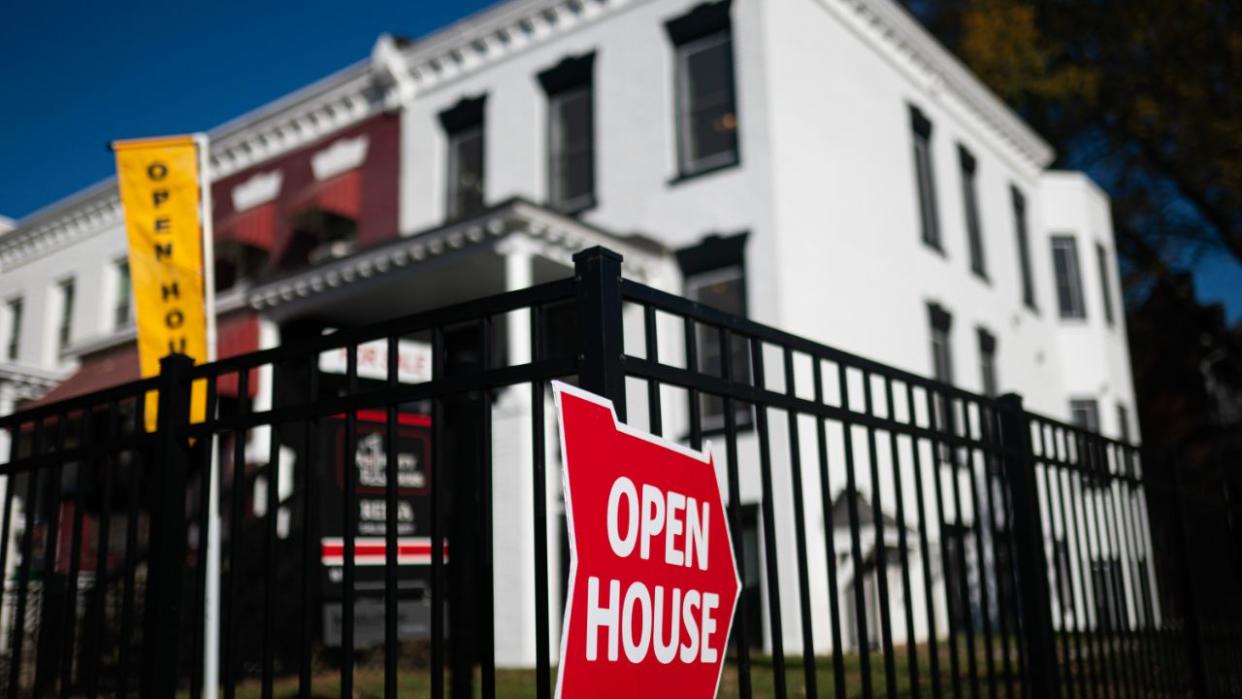 open house sign in front of home