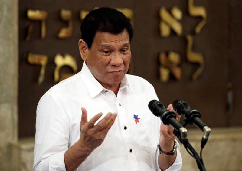 Philippine President Rodrigo Duterte gestures during his speech at the Beit Yaacov Synagogue, The Jewish Association of the Philippines in Makati city, metro Manila, Philippines October 4, 2016. REUTERS/Aaron Favila/Pool