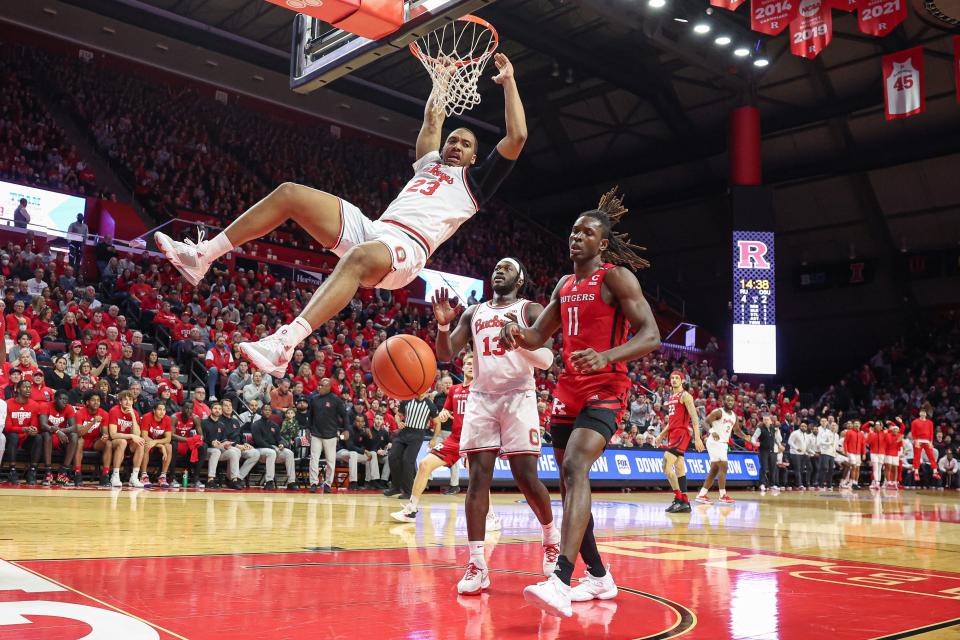 Jan 15, 2023; Piscataway, New Jersey, USA; Ohio State Buckeyes forward Zed Key (23) dunks during the first half in front of Rutgers Scarlet Knights center Clifford Omoruyi (11) at Jersey Mike's Arena. Mandatory Credit: Vincent Carchietta-USA TODAY Sports