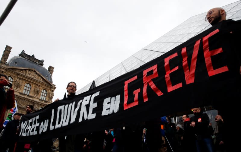 Striking workers block entry to Louvre Museum in Paris