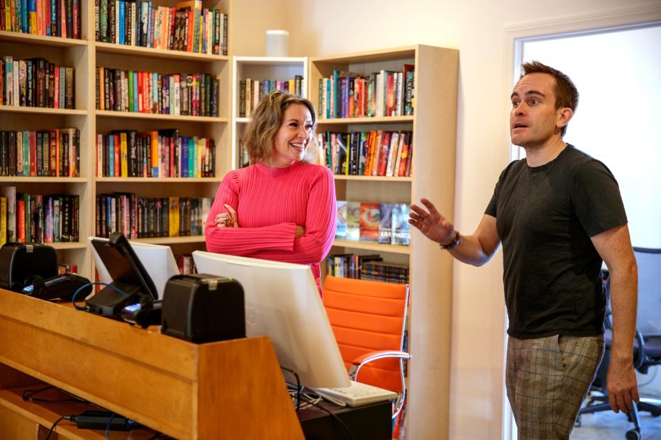 The Best Bookstore in Palm Springs owners Sarah Lacy, left, and Paul Carr engage with customers on opening day Wednesday.