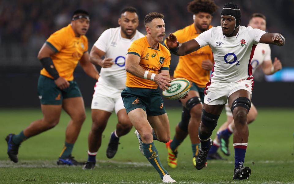 Nic White of the Wallabies chased down by Maro Itoje - GETTY IMAGES