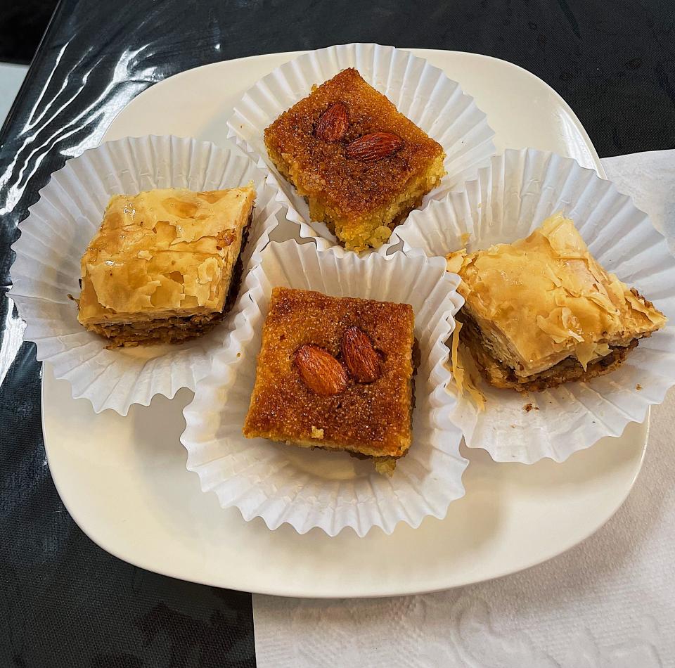 Delicate squares of baklava and namourah are served for dessert at Mariam.