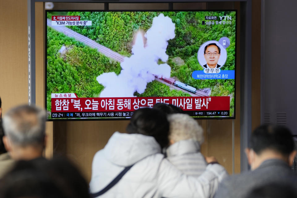 A TV screen showing a news program reporting about North Korea's missile launch with file footage is seen at the Seoul Railway Station in Seoul, South Korea, Thursday, Nov. 3, 2022. North Korea continued its barrage of weapons tests on Thursday, firing at least three missiles including a suspected intercontinental ballistic missile that forced the Japanese government to issue evacuation alerts and temporarily halt trains. (AP Photo/Lee Jin-man)