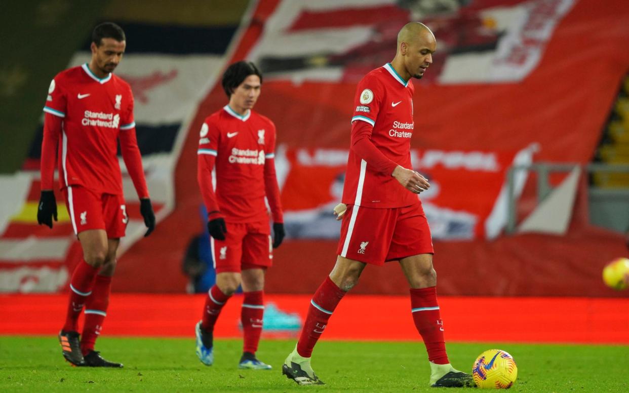 Liverpool players trudge off the pitch following defeat to Burnley - Ian Hodgson