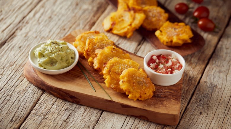 Tostones on board with dips