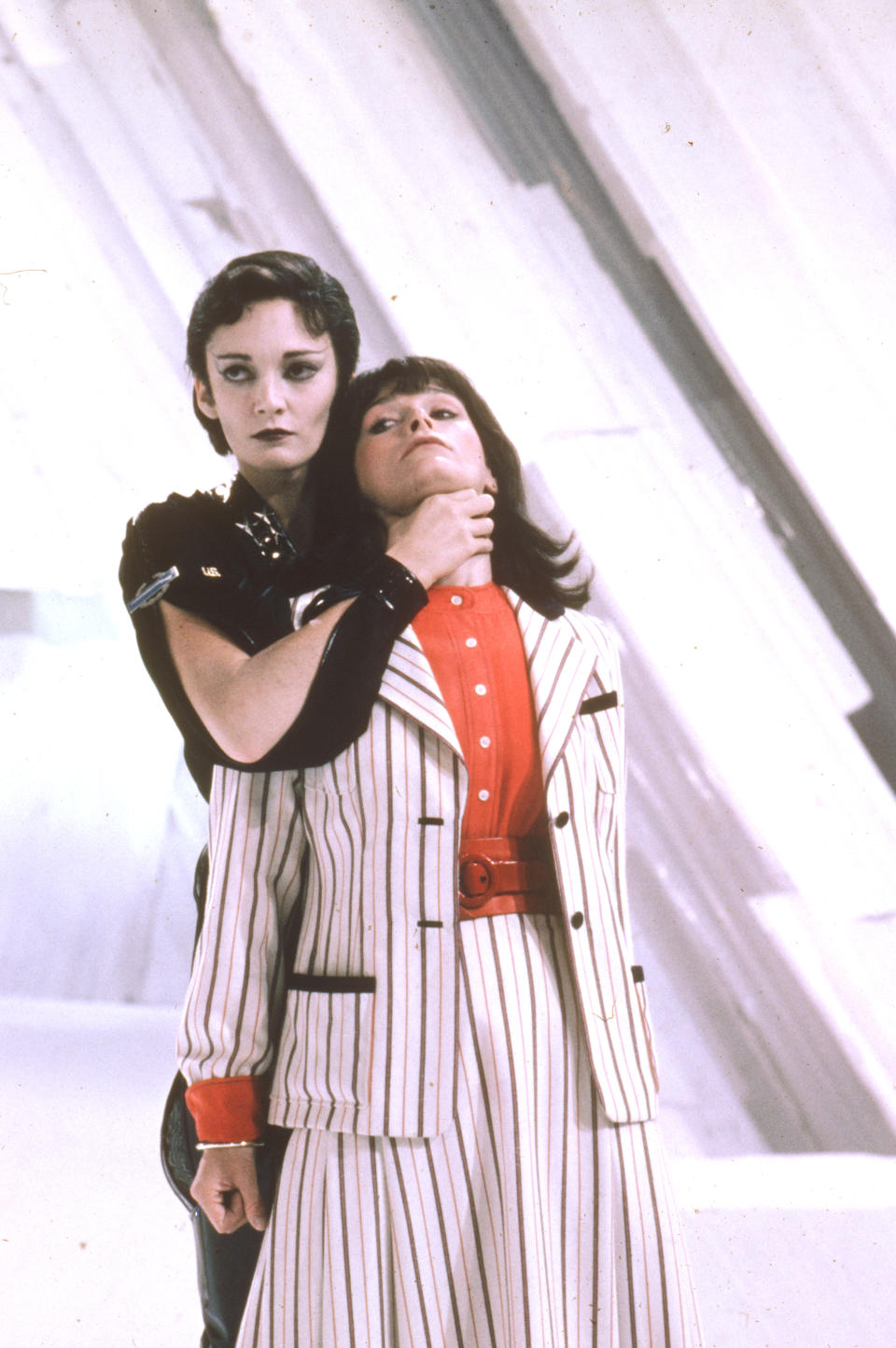 Ursa (Sarah Douglas) holds Lois Lane (Margot Kidder) captive in Superman II (Warner Bros.)