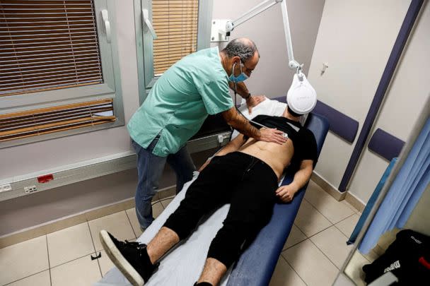 FILE PHOTO: A patient suffering from Long COVID is examined in the post-coronavirus disease (COVID-19) clinic of Ichilov Hospital in Tel Aviv, Israel, February 21, 2022. Picture taken February 21, 2022.  (Amir Cohen/Reuters)