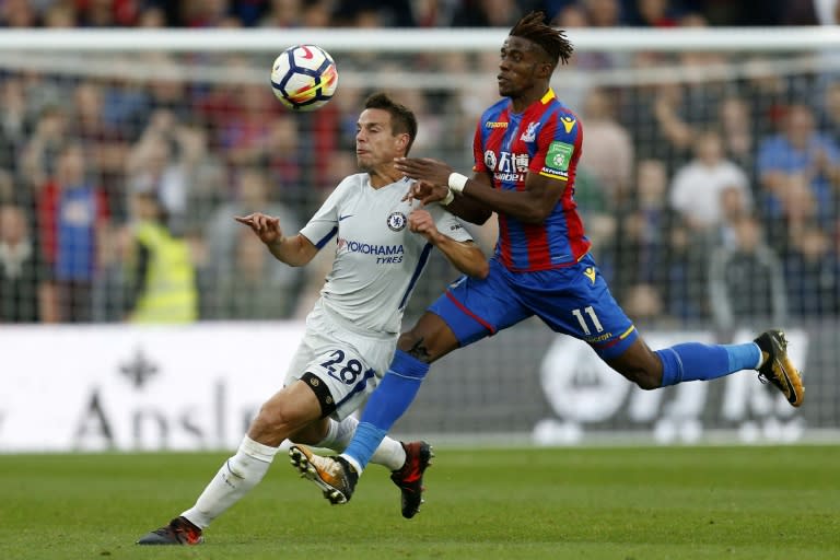 Chelsea's Cesar Azpilicueta (L) vies with Crystal Palace's Wilfried Zaha during their English Premier League match in south London on October 14, 2017