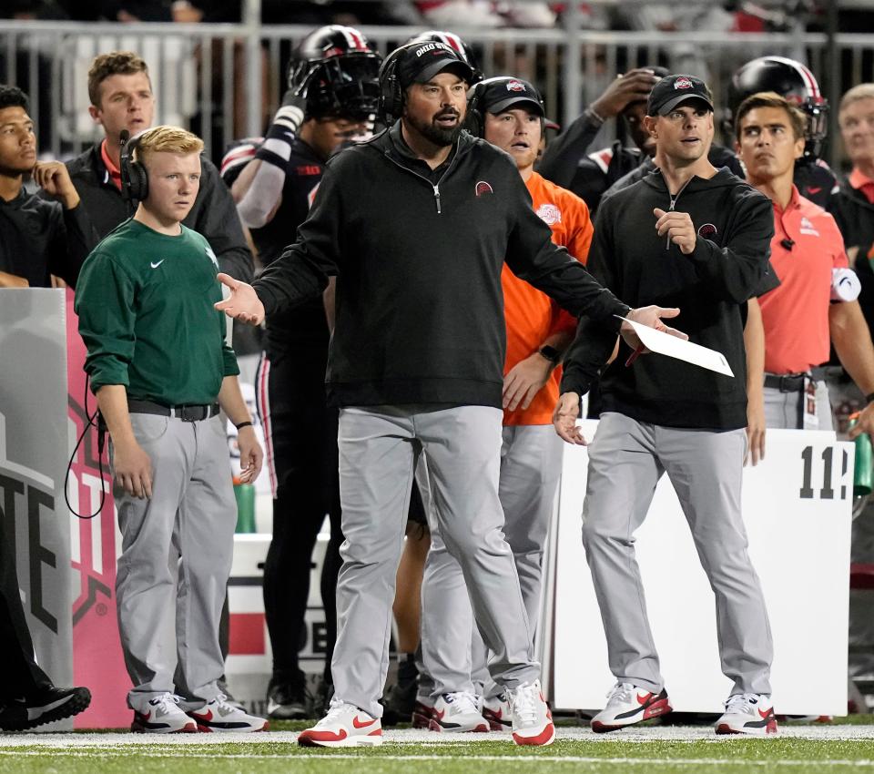 Ohio State coach Ryan Day questions a call in the second quarter of a 52-21 win over Wisconsin.