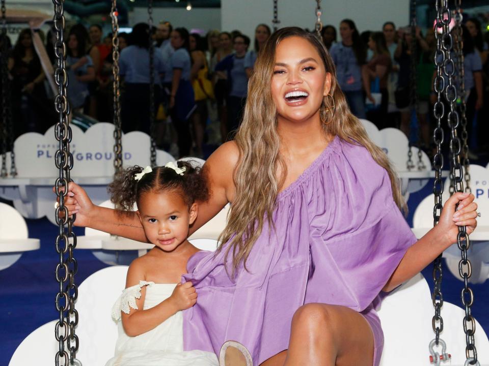 Luna Legend and Chrissy Teigen pose for a photo during POPSUGAR Play/Ground at Pier 94 on June 23, 2019 in New York City.