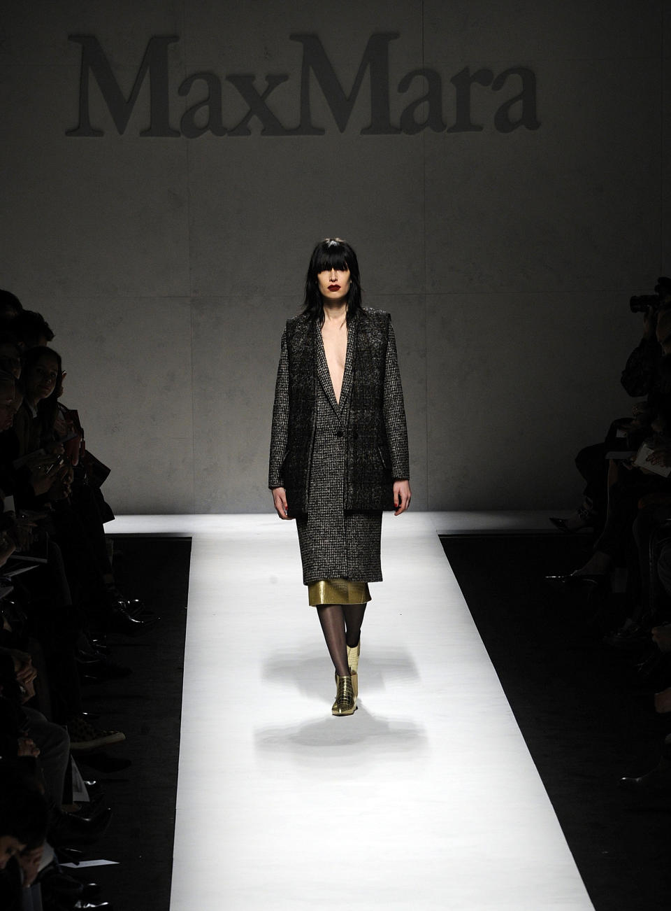 A model wears a creation for Max Mara women's Fall-Winter 2014-15 collection, part of the Milan Fashion Week, unveiled in Milan, Italy, Thursday, Feb. 20, 2014. (AP Photo/Giuseppe Aresu)