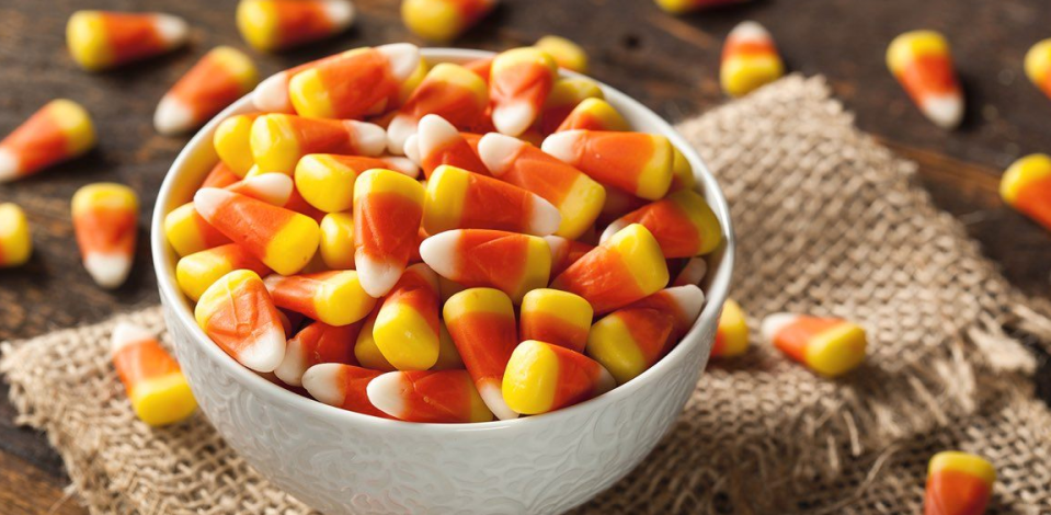 Candy corn originated in the late 19th century and today is one of most beloved -- and most disliked Halloween candies.
