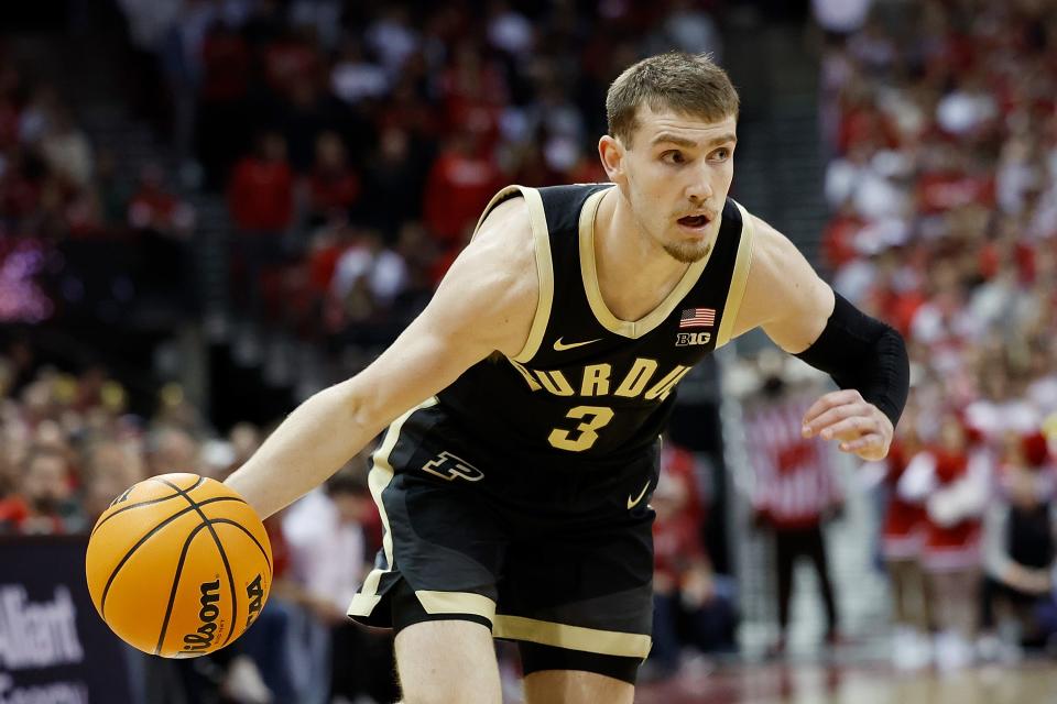 MADISON, WISCONSIN - FEBRUARY 04: Braden Smith #3 of the Purdue Boilermakers drives to the basket in the first half of the game against the Wisconsin Badgers at Kohl Center on February 04, 2024 in Madison, Wisconsin. (Photo by John Fisher/Getty Images)