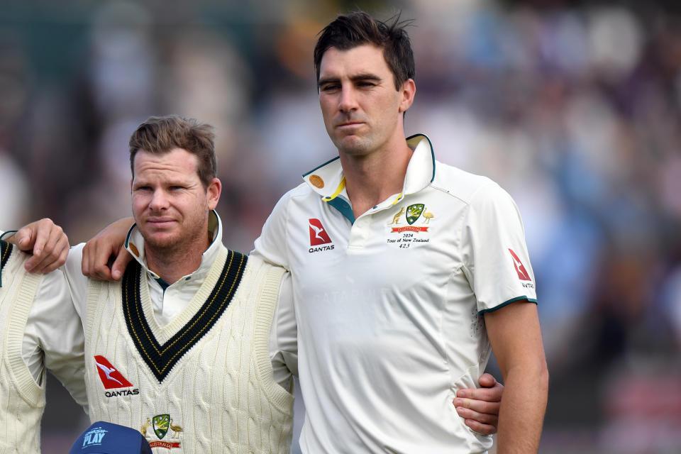 CHRISTCHURCH, NEW ZEALAND - MARCH 8: Steve Smith and captain Pat Cummins of Australia (L-R) line up for their national anthem during day one of the Second Test in the series between New Zealand and Australia at Hagley Oval on March 8, 2024 in Christchurch, New Zealand. (Photo by Kai Schwoerer/Getty Images)