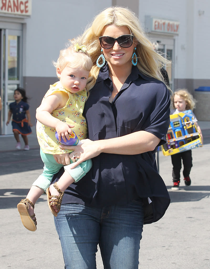 Jessica Simpson, her daughter Maxwell Johnson, her sister Ashlee and Ashlee's son Bronx leave Toys 'R' Us in Burbank, CA