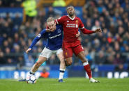 <p>Liverpool’s Georginio Wijnaldum iwraps himself around Everton’s Tom Davies </p>