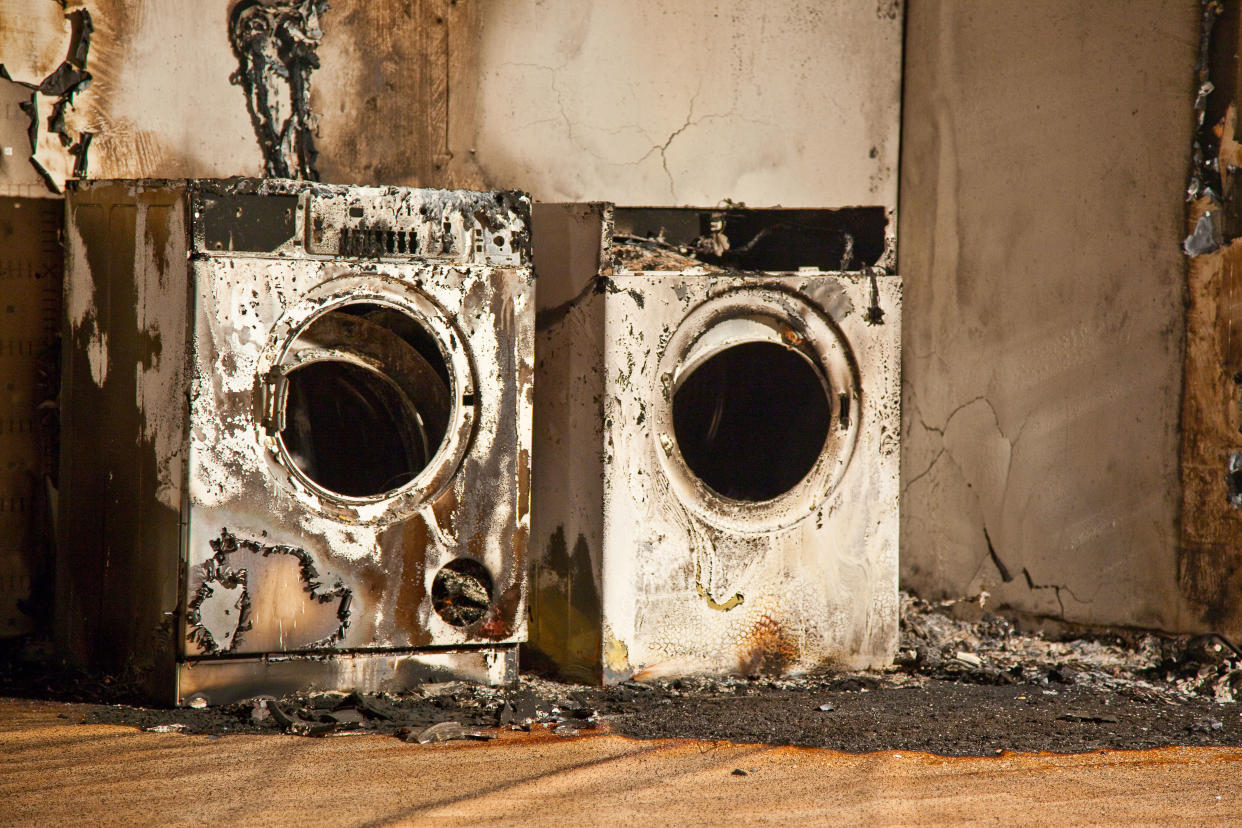 Kiel, Germany, a burnt-out tumble dryer and washing machine