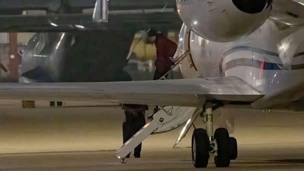 PHOTO: TOPSHOT - American basketball star Brittney Griner gets out of a plane after landing at the JBSA-Kelly Field Annex runway on December 9, 2022 in San Antonio, after she was released from a Russian prison in exchange for a notorious arms dealer. (Suzanne Cordeiro/AFP via Getty Images)