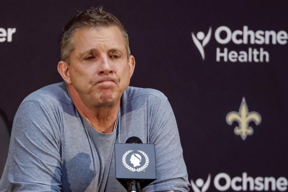 Sean Payton reacts during an NFL football press conference announcing his resignation as head coach of the New Orleans Saints, Tuesday, Jan. 25, 2022, in Metairie, La. (AP Photo/Derick Hingle)