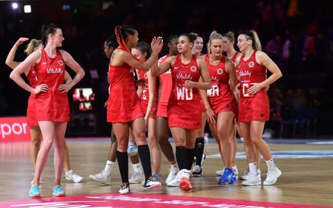 Laura Malcolm of Vitality Roses high fives her team mates - Credit: Getty Images