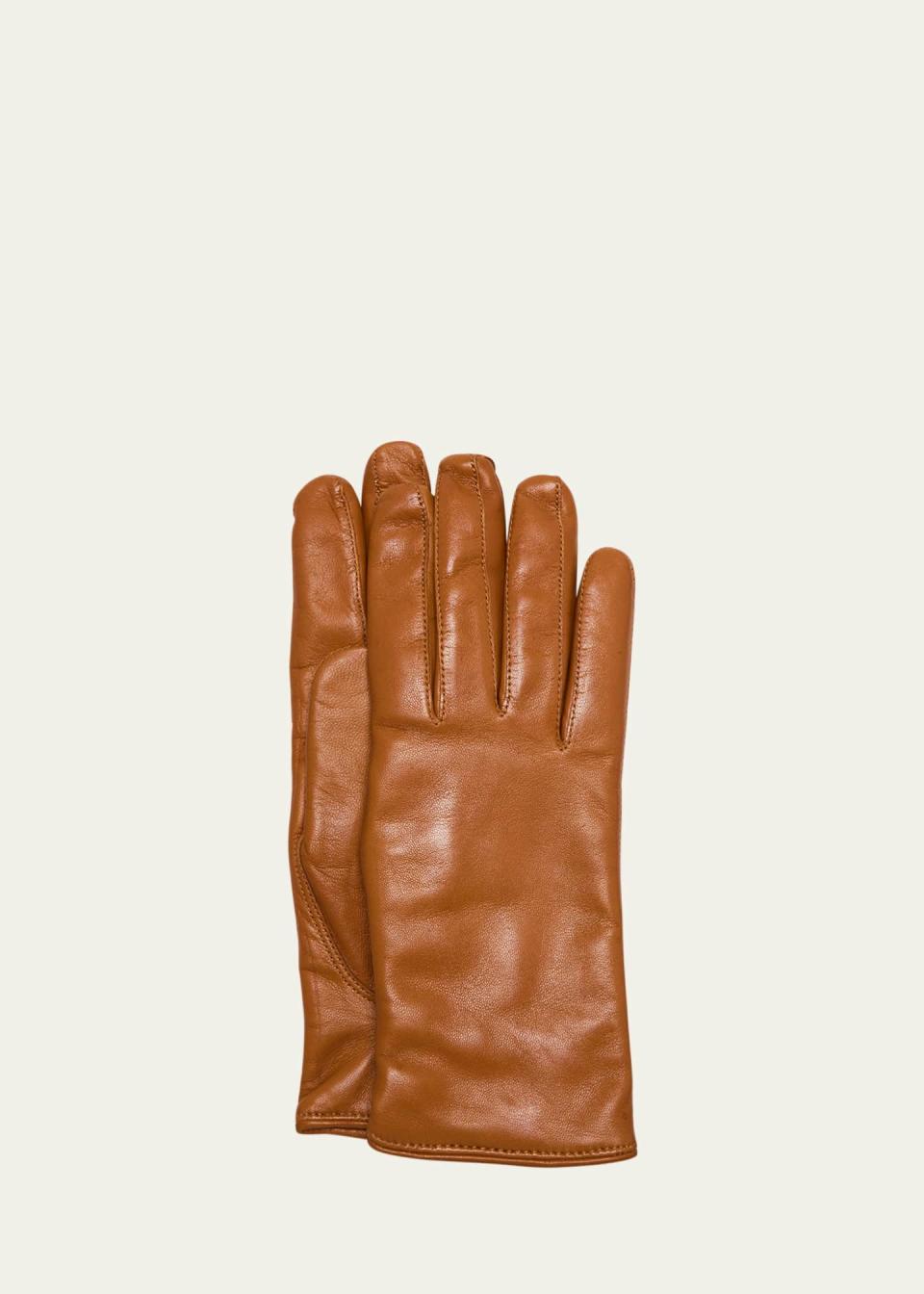 <p><a href="https://go.redirectingat.com?id=74968X1596630&url=https%3A%2F%2Fwww.bergdorfgoodman.com%2Fp%2Fhestra-gloves-mens-cashmere-lined-hairsheep-leather-gloves-prod183160042&sref=https%3A%2F%2Fwww.harpersbazaar.com%2Ffashion%2Ftrends%2Fg46067824%2Fbest-stocking-stuffers-for-men%2F" rel="nofollow noopener" target="_blank" data-ylk="slk:Shop Now;elm:context_link;itc:0;sec:content-canvas" class="link ">Shop Now</a></p><p>Cashmere-Lined Hairsheep Leather Gloves</p><p>bergdorfgoodman.com</p><p>$225.00</p><span class="copyright">bergdorfgoodman.com</span>