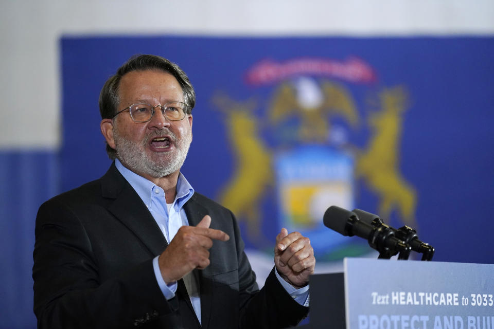 Sen. Gary Peters, D-Mich., speaks during an event with Democratic presidential candidate former Vice President Joe Biden at Beech Woods Recreation Center, in Southfield, Mich., Friday, Oct. 16, 2020. (AP Photo/Carolyn Kaster)