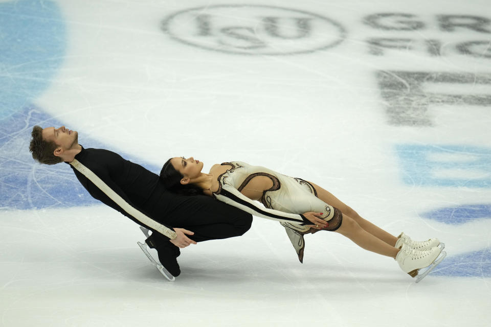 Gold medalists United States Madison Chock and Evan Bates compete in the Ice Dance Final for the ISU Grand Prix of Figure Skating Final held in Beijing, Saturday, Dec. 9, 2023. (AP Photo/Ng Han Guan)