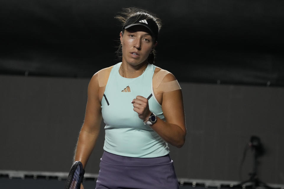 Jessica Pegula of the United States reacts after winning a point over Maria Sakkari of Greece, during a women's singles match at the WTA Finals tennis championships, in Cancun, Mexico, Thursday, Nov. 2, 2023. (AP Photo/Fernando Llano)