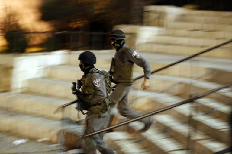 Israeli security forces near the site where a Palestinian carried out a stabbing attack in the old city of Jerusalem on October 3, 2015