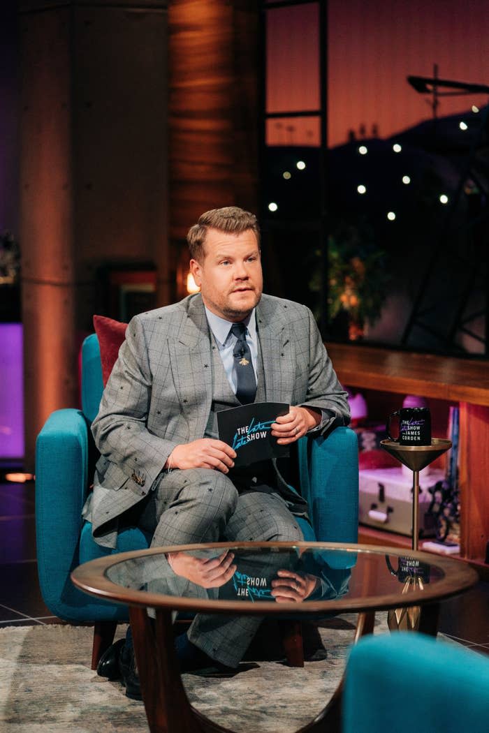 James sitting as he hosts his show