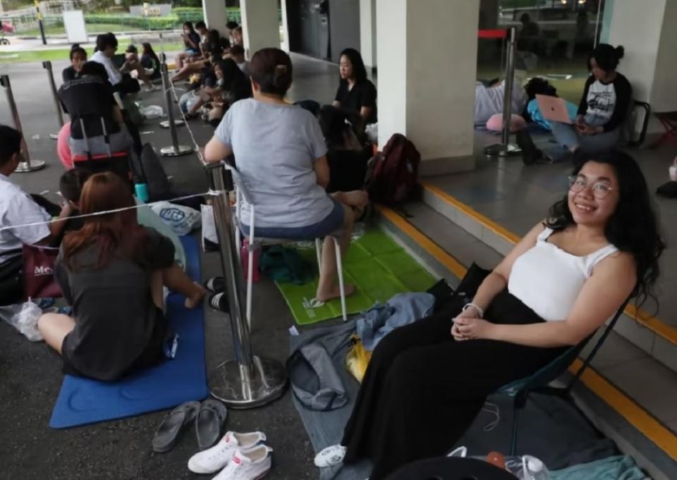 TODAY journalist Loraine Lee queuing up for Taylor Swift concert tickets at the Bukit Panjang SingPost outlet July 6. — TODAY pic 