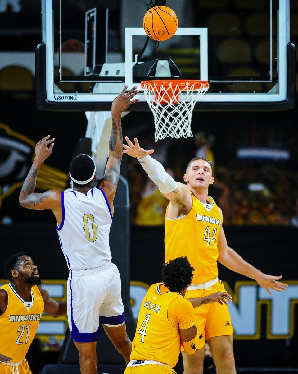 UW-Milwaukee Panthers center Joey St. Pierre defends a shot by Alcorn State Braves center Lenell Henry in the first half of their game Sunday at UW-Milwaukee Panther Arena. The Panthers fell to the Braves, 61-57, to drop to 1-5.