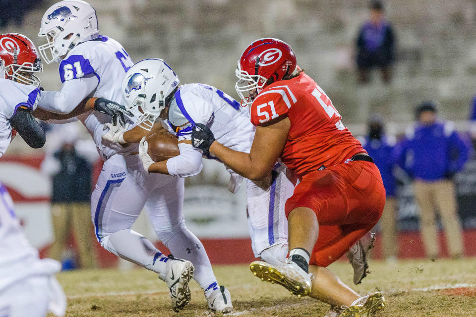 Greenville's Julius Tate (51) makes the tackle. Greenville High hosted Walhalla High in the 1st round of the AAAA football playoffs.  Friday November 5,2021