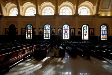 A worker cleans the interior of the new Coptic Cathedral of the Nativity in the New Administrative Capital (NAC) east of Cairo, Egypt January 3, 2019. Picture taken January 3, 2019. REUTERS/Amr Abdallah Dalsh