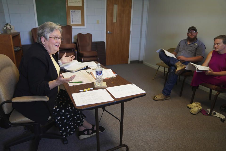 The Rev. Linda Barnes Popham leads a young adult Bible study at Fern Creek Baptist Church, Sunday, May 21, 2023, in Louisville, Ky. (AP Photo/Jessie Wardarski)