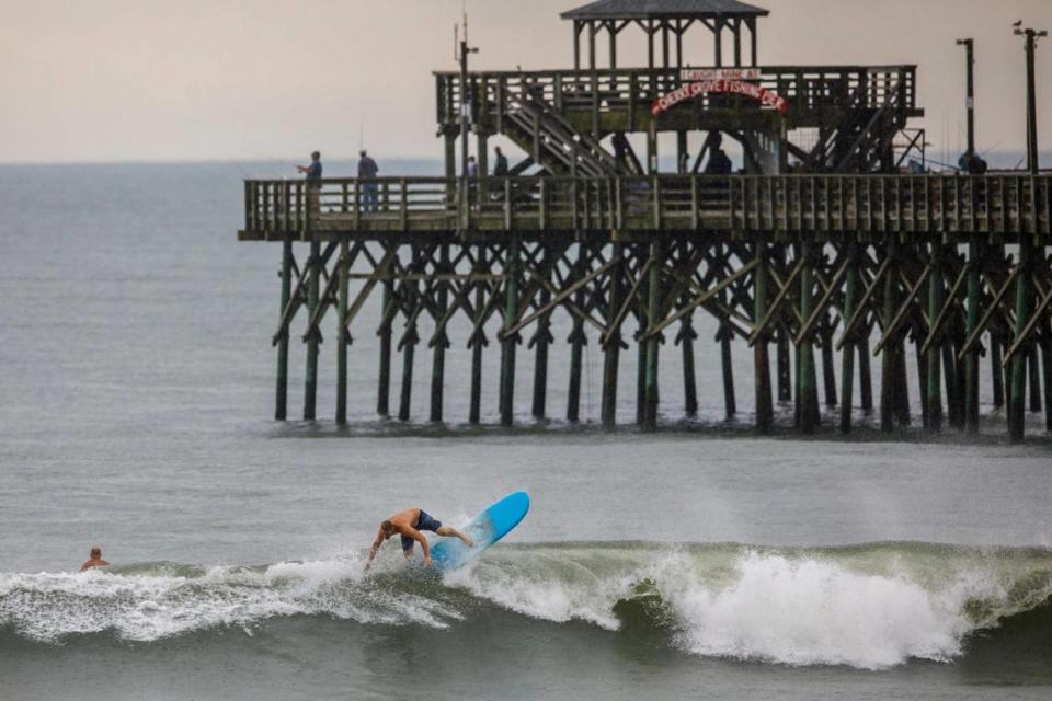 Surfers in Cherry Grove in North Myrtle Beach, S.C. File photo.