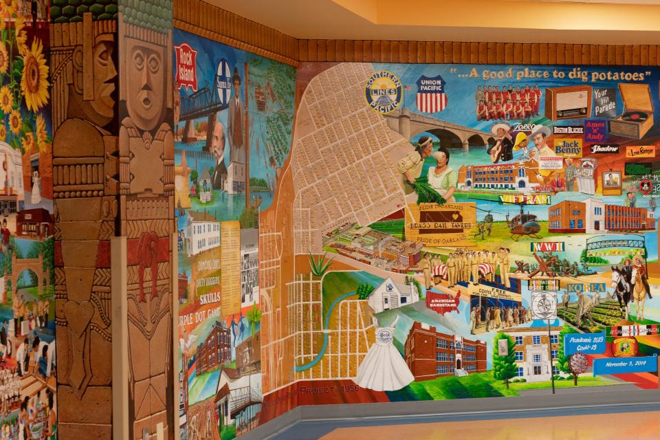 The last section of Andy Valdivia's "Our History" mural in the basement of the Marlo Cuevas Balandran Activity Center features "Barrios," or "neighborhoods" in Spanish.