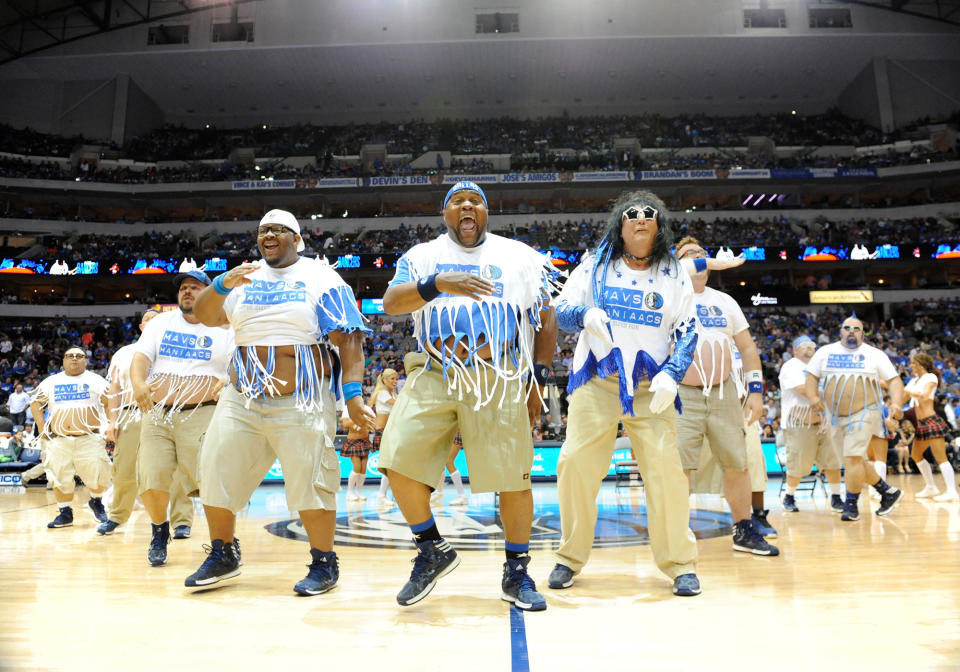 The Mavs ManiAACs perform during an NBA game between the Golden State Warriors and the Dallas Mavericks at the American Airlines Center in Dallas, TX on April 1, 2014. | Albert Pena—Icon SMI/Corbis via Getty Images