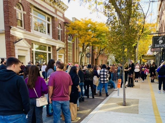 people lining up at vampfangs in salem massachusetts