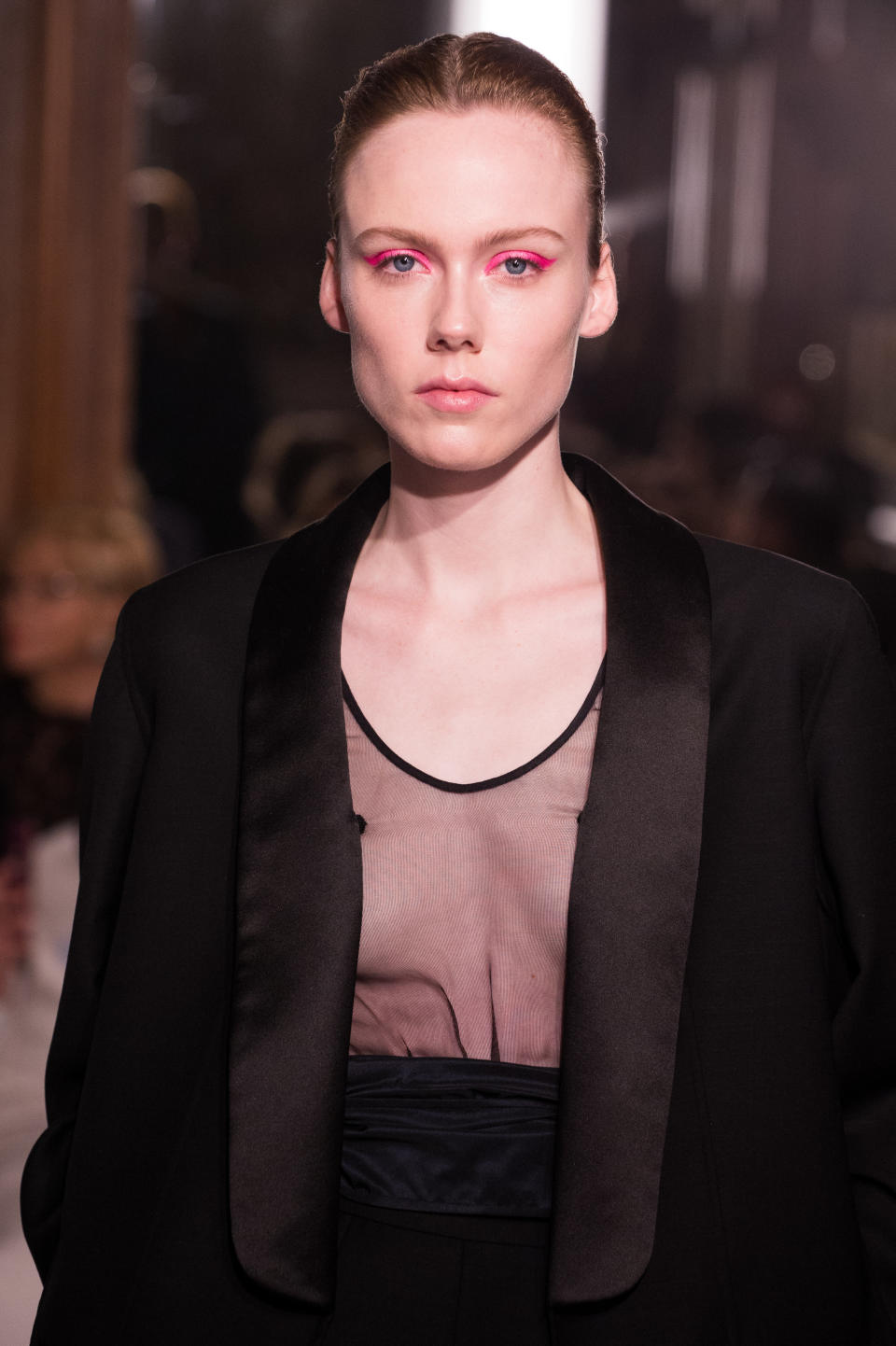 At&nbsp;Valentino's spring 2018 couture show in January, models came down the runway with a variety of colors, including this&nbsp;fluorescent pink, painted on their eyelids. The look was the work of makeup artist <a href="https://www.allure.com/gallery/paris-spring-2018-couture-best-runway-hair-makeup" target="_blank">Pat McGrath</a>.&nbsp;