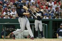 Aug 8, 2018; Washington, DC, USA; Atlanta Braves third baseman Charlie Culberson (16) hits a three run home run during the second inning against the Washington Nationals at Nationals Park. Tommy Gilligan-USA TODAY Sports