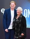 <p>Dame Judi Dench brings grandson Sam Williams to the <em>Belfast</em> premiere at The Royal Festival Hall on Oct. 12 in London.</p>