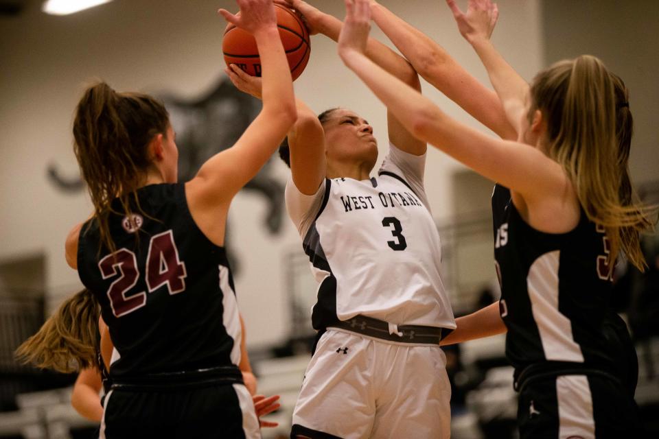 West Ottawa's Gabby Reynolds drives to the basket against Holland Christain Friday, Dec. 2, 2022, at West Ottawa High School. 