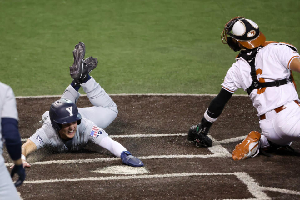 AUSTIN, TX – APRIL 04: BYU Cougars outfielder Cooper Vest (7) touches home plate as he slides in head first during the Big 12 baseball game between the Texas Longhorns and the BYU Cougars on April 4, 2024, at UFCU Disch-Falk Field in Austin, TX. (Photo by David Buono/Icon Sportswire via Getty Images)