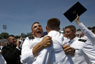 <p>Graduating members of the U.S. Naval Academy celebrate at the end of the Academy’s graduation and commissioning ceremony, Friday, May 25, 2018, in Annapolis, Md. (Photo: Patrick Semansky/AP) </p>