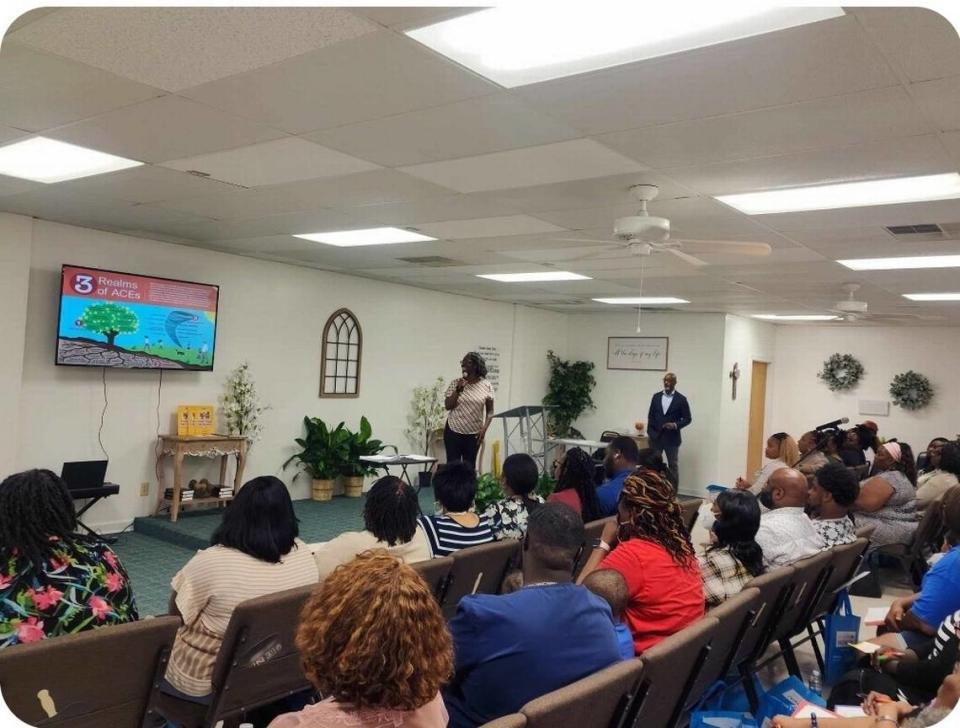 Dawn Baldwin Gibson presents during a community listening session in June at the Peletah Ministries church in New Bern.